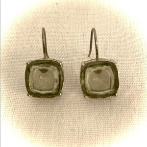 Silver Tone dangle earrings with an Smokey glass centre